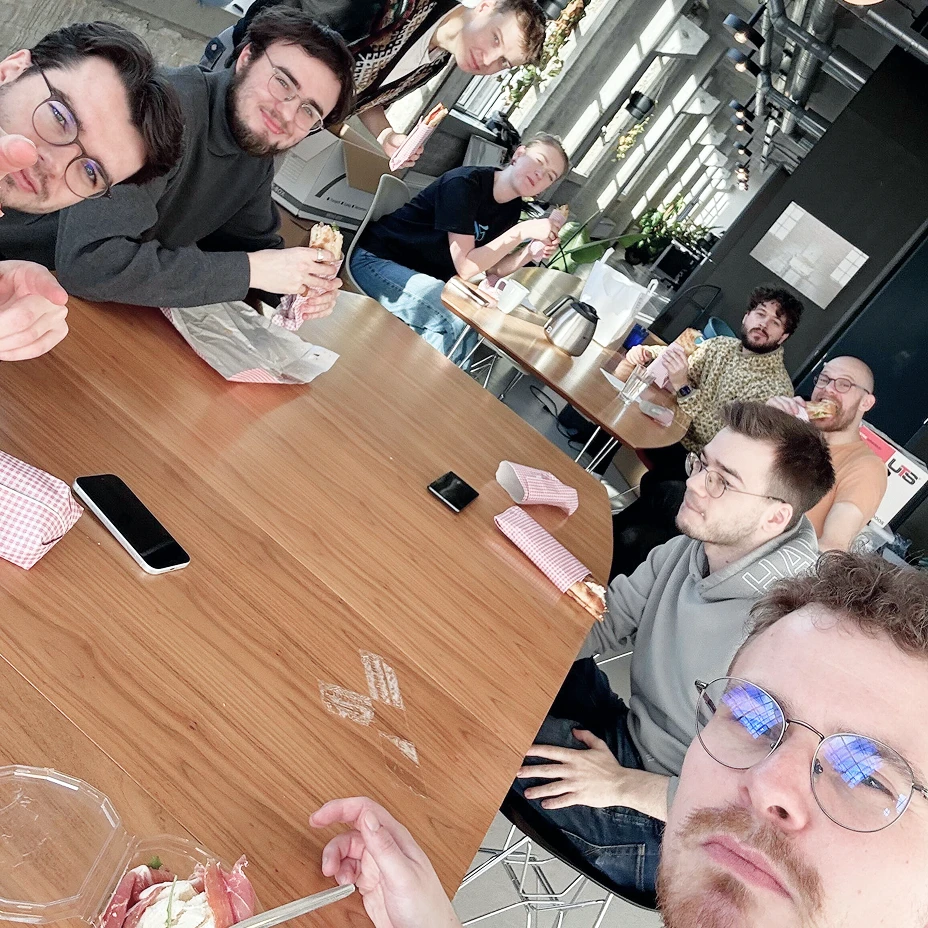 The 35 team around a table